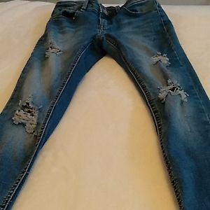Dark blue skinny jeans with rips
